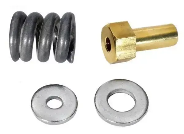 Spring/barrel nut assembly